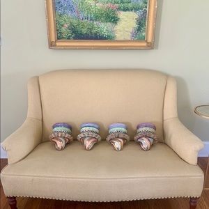 Mackenzie Childs ceramic painted feet; 2 sets of 4